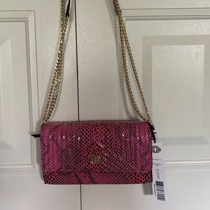 Small Kate Landry with adjustable strap.  NWT